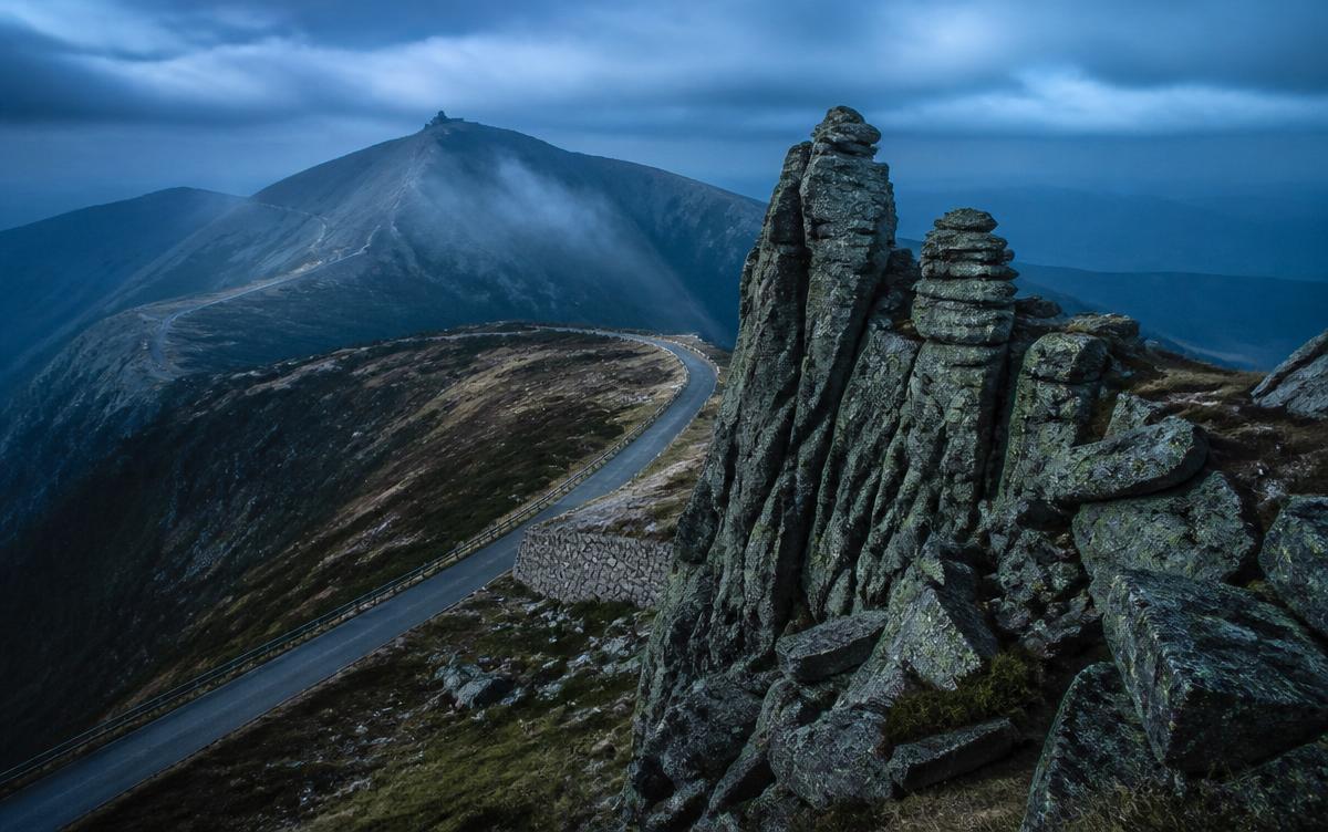 Rocky mountain ridge traverse in the Karkonosze at blue hour